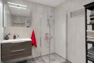 Luxury master bathroom remodel in La Jolla with walk-in shower, heated floors, and premium fixtures