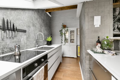 Crown Point modern kitchen design with waterfall island and seamless indoor-outdoor flow